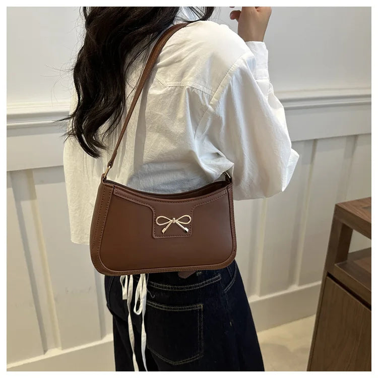Corehide™ Stylish Shoulder Bag with Metal Bow Decoration, Versatile Underarm Bag, Classic Brown and Black Baguette Bag for Women Daily Use
