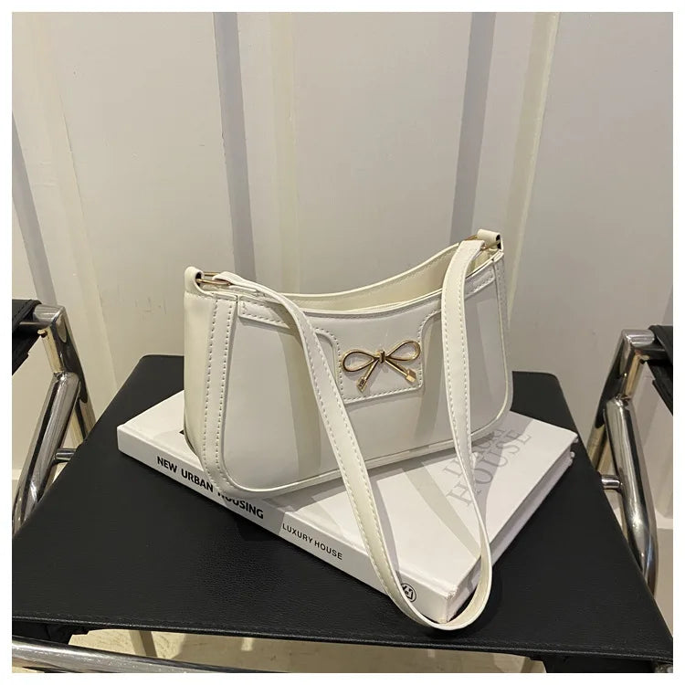 Corehide™ Stylish Shoulder Bag with Metal Bow Decoration, Versatile Underarm Bag, Classic Brown and Black Baguette Bag for Women Daily Use