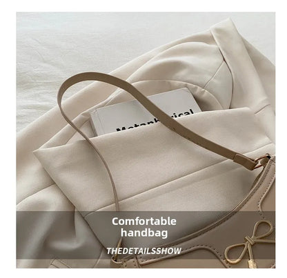 Corehide™ Stylish Shoulder Bag with Metal Bow Decoration, Versatile Underarm Bag, Classic Brown and Black Baguette Bag for Women Daily Use